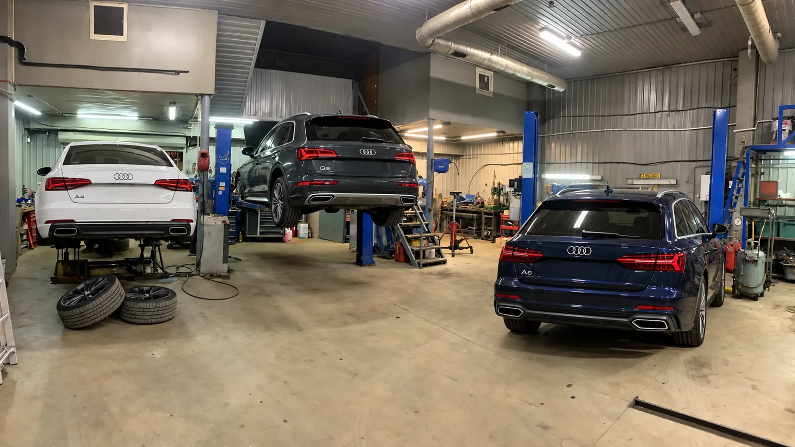Иллюстрация автомобилей Audi в техцентре
